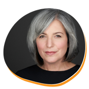 White woman with mid-length grey hair