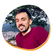 Latino male with dark black hair and red shirt